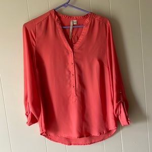 Coral colored blouse with buttons
